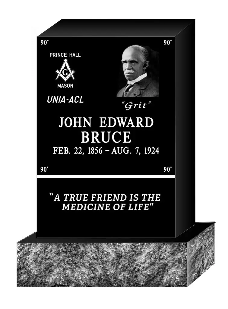 Black granite headstone inscribed with “PRINCE HALL MASON,” “UNIA-ACL,” and “John Edward Bruce, Feb. 22, 1856 – Aug. 7, 1924,” along with the quote “A true friend is the medicine of life.
